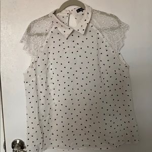 White blouse with black hearts